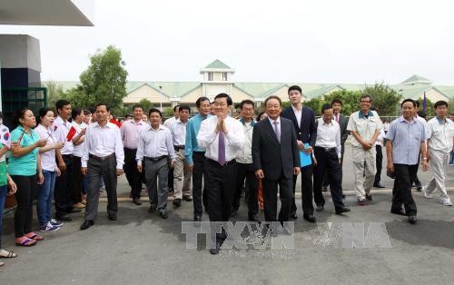 Presiden Truong Tan Sang melakukan kunjungan kerja di provinsi Tay Ninh - ảnh 1